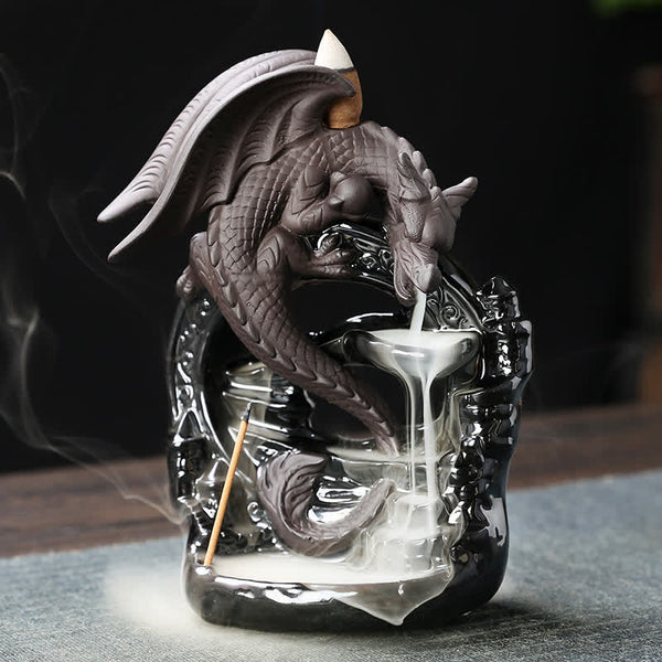 Ceramic Dragon Backflow Incense Burner – winged dragon with white smoke waterfall flowing into black basin, mystical