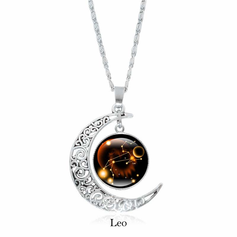 Zodiac Moon Protection Copper Necklace - Silver crescent moon with Leo zodiac constellation cabochon in amber and golden orange on black background with rope chain
