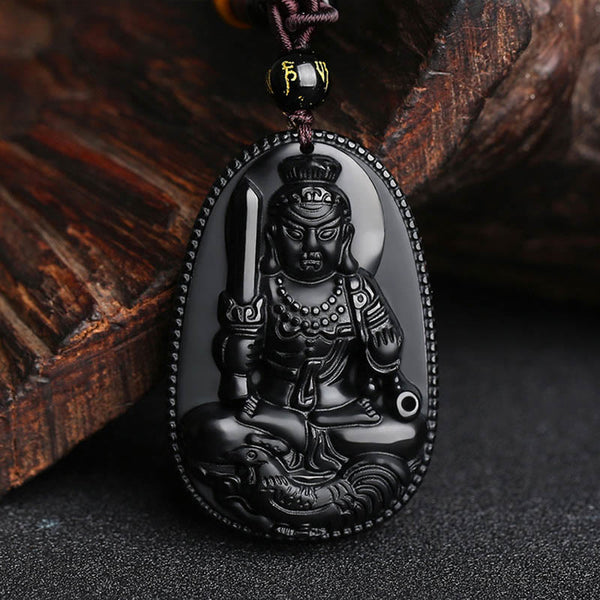Chinese Zodiac Buddha Black Obsidian Necklace – seated guardian deity with ritual implements on teardrop obsidian, beaded border and mantra bead, zodiac amulet
