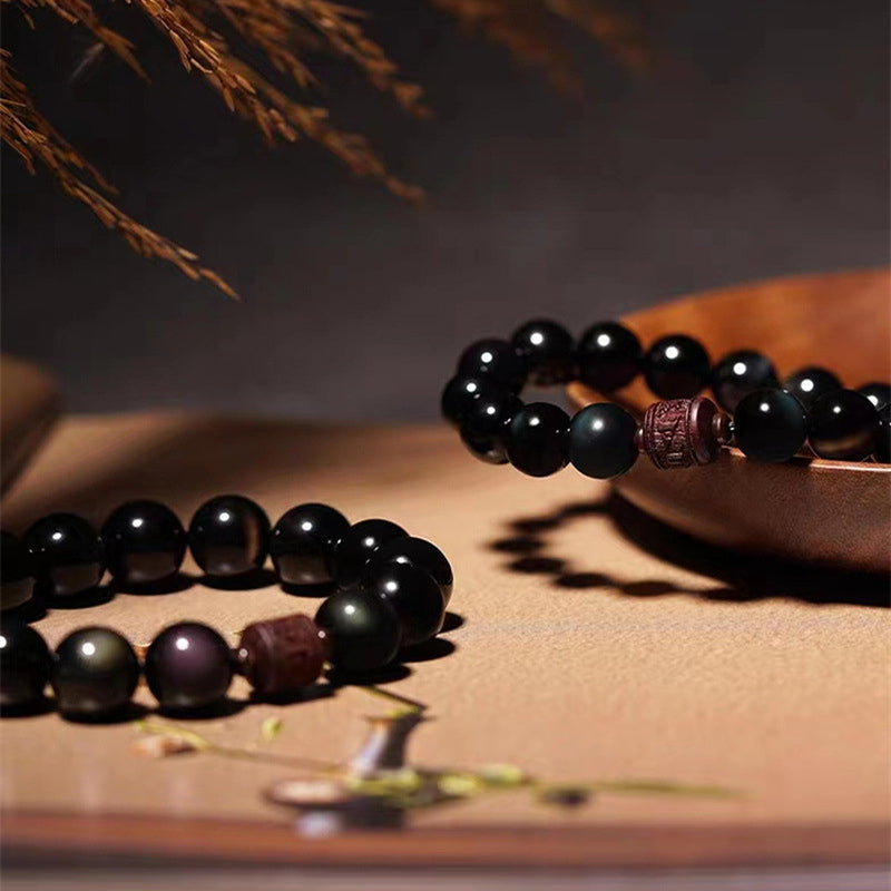 Gold Sheen & Rainbow Obsidian Fu Bracelet – multiple bracelets on wood bowl, obsidian jewelry set
