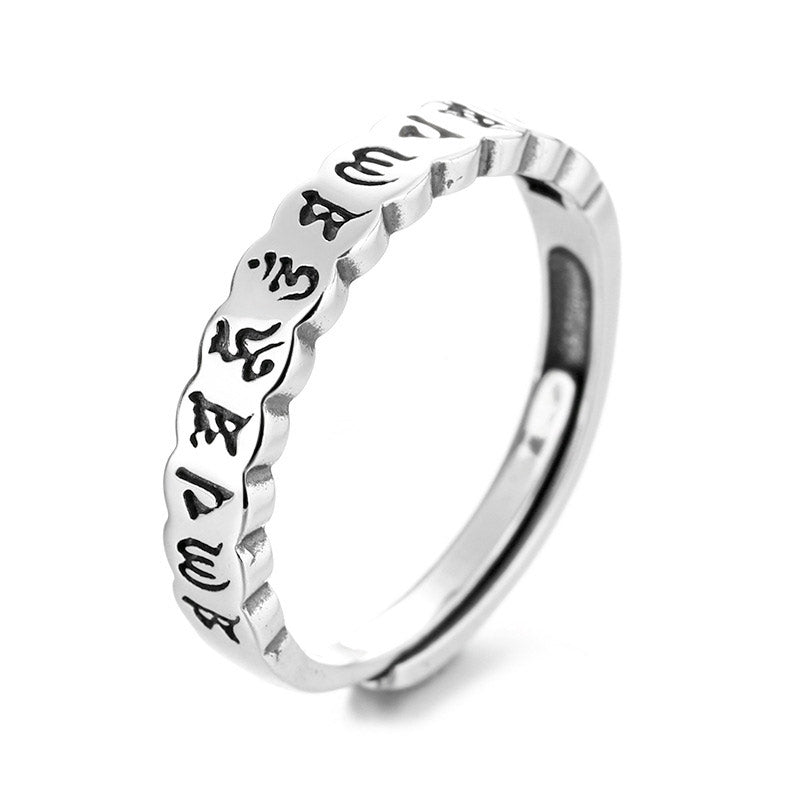 925 Sterling Silver Om Mani Padme Hum Ring – white background shot of silver band with Om Mani Padme Hum engraving, spiritual