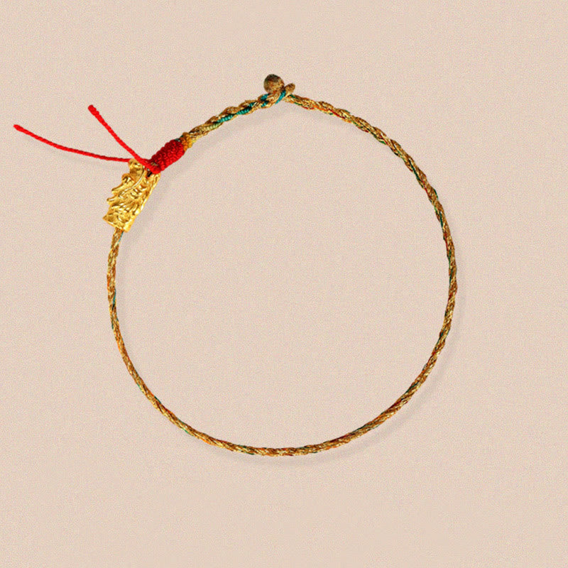 Colorful Dragon Carved Braided Bracelet – Full circle on neutral background showing dragon charm, Auspicious