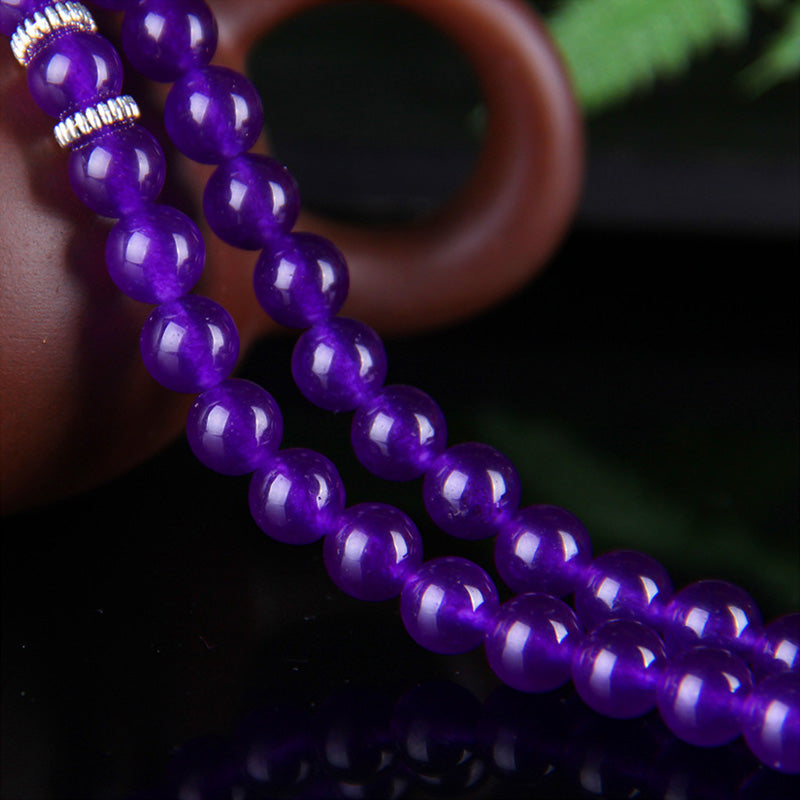 Amethyst PiXiu Bracelet – Close-up purple amethyst beads with silver spacer detail