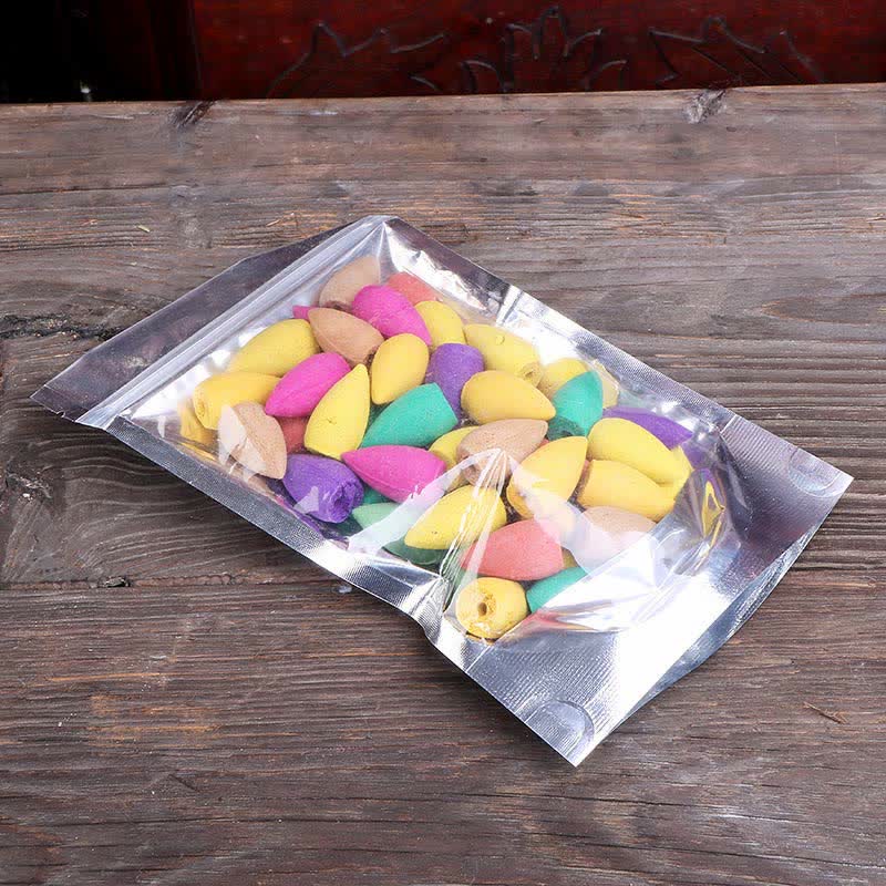 Nordic Dragon Backflow Incense Burner colorful backflow cones in foil pouch on rustic wood, multi-color incense set