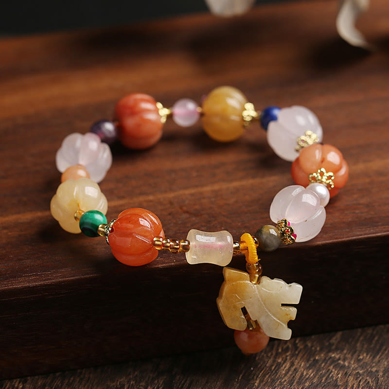 Golden Silk Jade Gourd Bracelet – Jade pumpkin beads with PiXiu charm on wood