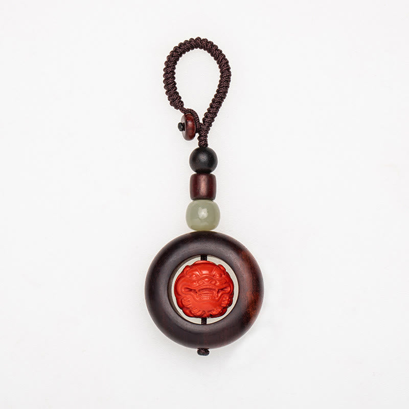 Tibetan Om Mani Padme Hum Sandalwood Cinnabar Protection Keychain – pixiu head front white background, sandalwood cinnabar charm