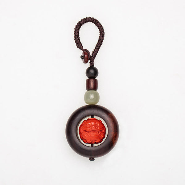 Tibetan Om Mani Padme Hum Sandalwood Cinnabar Protection Keychain – pixiu head front white background, sandalwood cinnabar charm