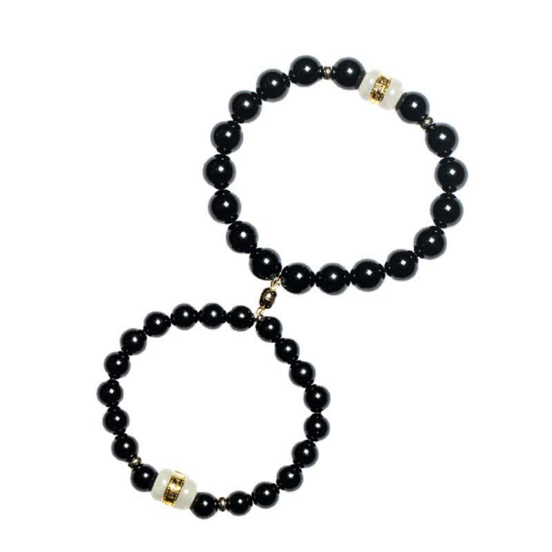 Black Obsidian Jade Bracelet – Couple set on white background in infinity arrangement, matching bead bracelets