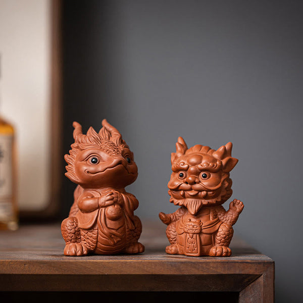 Luck Dragon Purple Clay Tea Pet - two guardian beasts on dark wood, prosperity pairing