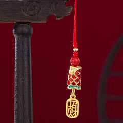 Koi Fish Cinnabar Ruyi Phone Charm – detail of cinnabar koi scales and ruyi head engraving, red phone charm tassel