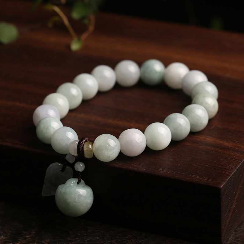 Natural Jade Pi Xiu Buddha Gourd Apple Success Bracelet – apple charm variant on dark wood table, success symbol