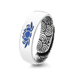 Tibetan Blue Lotus Enlightenment Ring - Three-quarter angle with blue enamel focal and wave pattern interior, statement ring