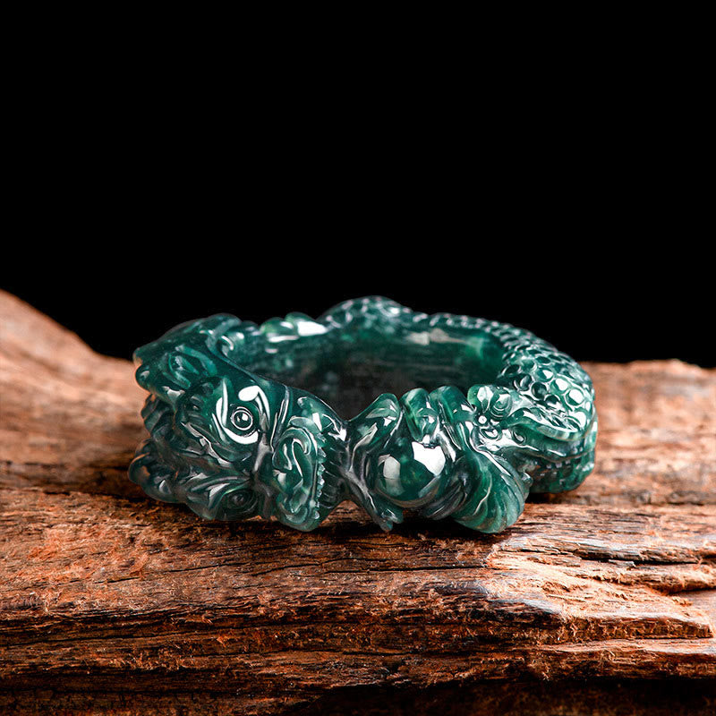 Cyan Jade Dragon Carved Ring horizontal on black, side profile, dragon claw detail, success jewelry