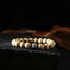 Peach Wood Cinnabar Bracelet – Geometric carved metal bead on light wood beads on slate, artisan spiritual