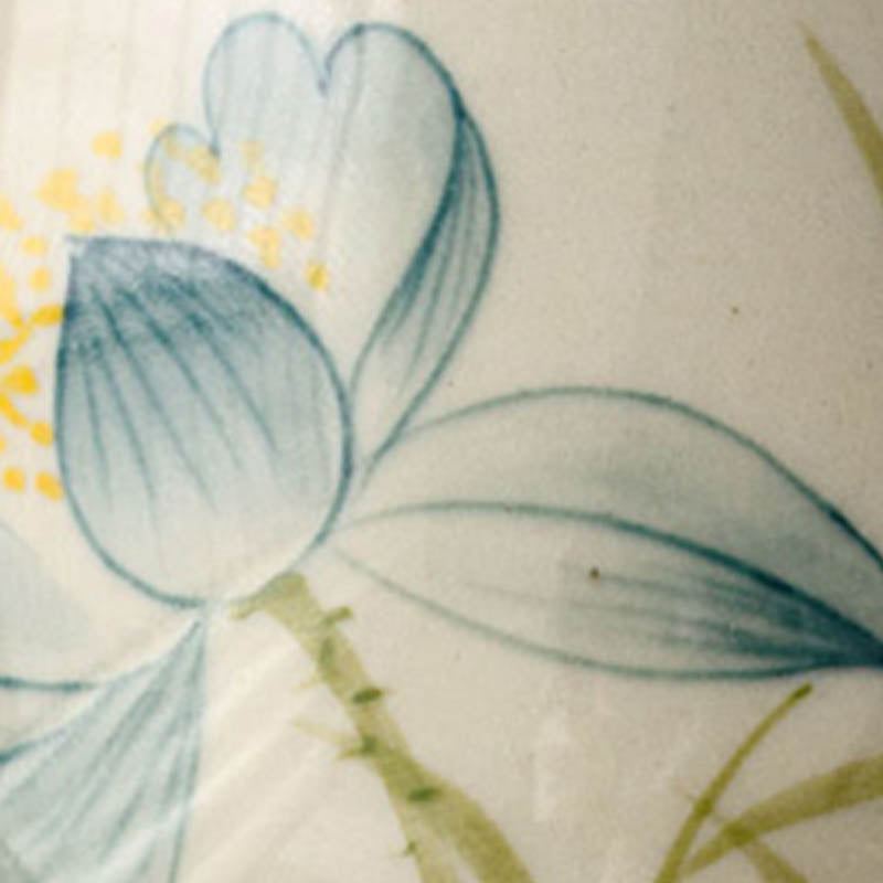 Hand Painted Lotus Tea Cup – extreme close-up of lotus flower center with blue petals and green stem, intimate