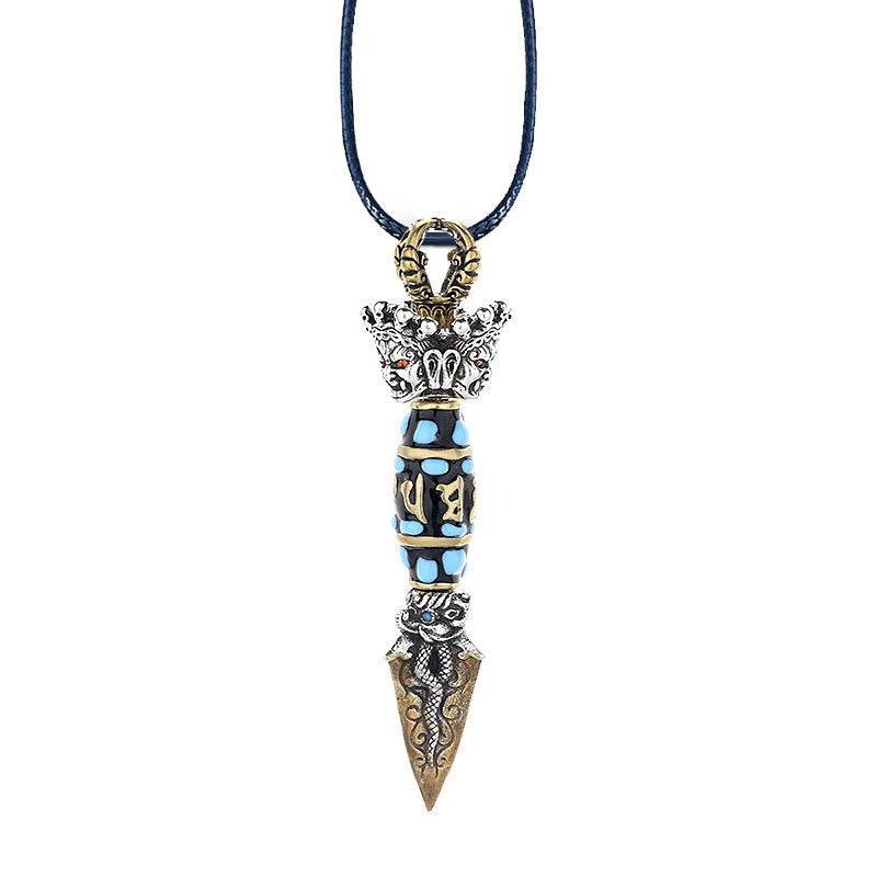 Tibetan Dzi Bead Dorje Pendant - White background view with gold script barrel and deity crown, Tibetan spiritual amulet