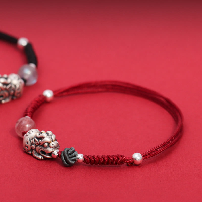 Silver PiXiu Strawberry Quartz Bracelet – Red cord bracelet side angle PiXiu on red