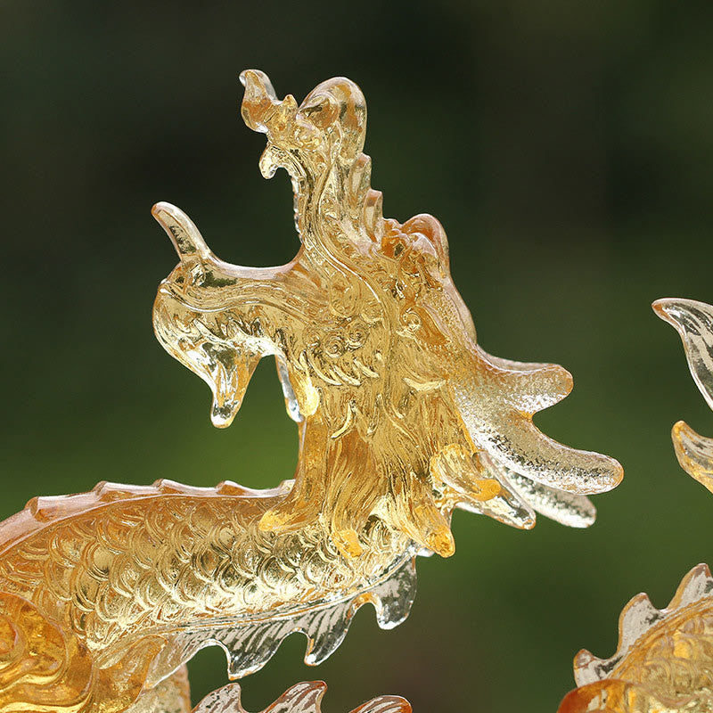 Chinese Zodiac Yellow Dragon Liuli Art Piece - close-up macro of horned dragon head in translucent amber glass, luck