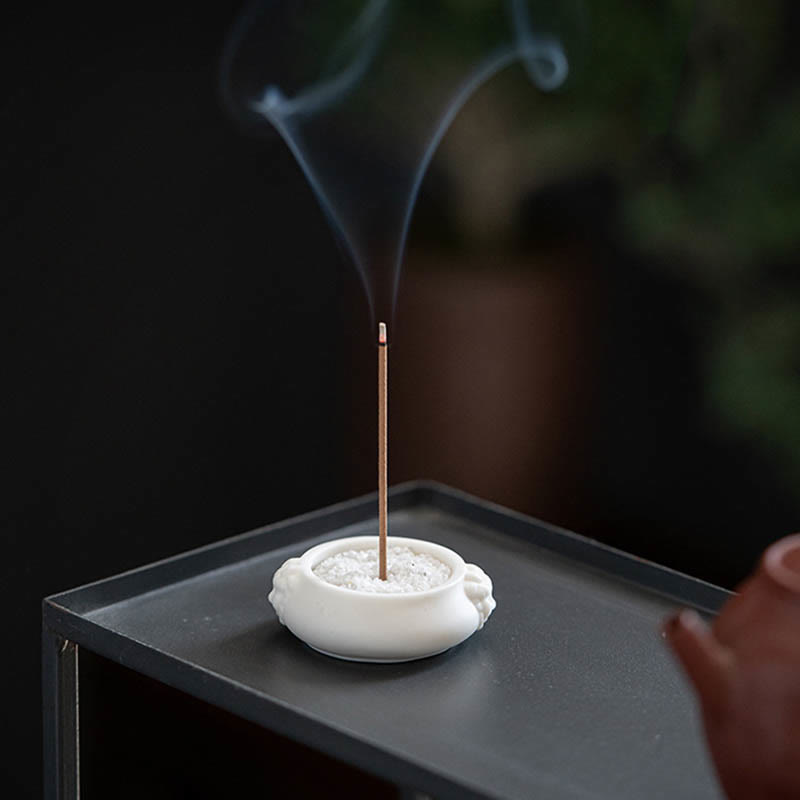 Dragon Ceramic Incense Burner – close-up burning incense tip with smoke on aged wood, atmospheric, healing