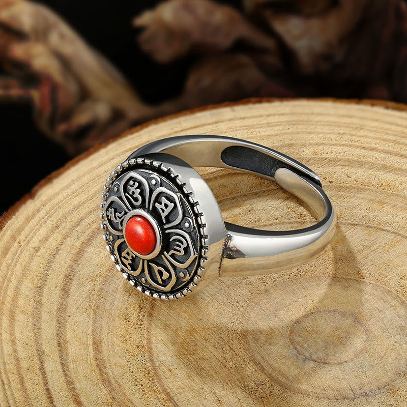 Tibetan Om Mani Padme Hum Ring – Red stone on carved wood close-up, Tibetan ring