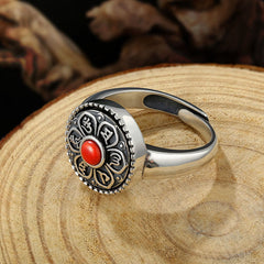 Tibetan Om Mani Padme Hum Ring – Red stone on carved wood close-up, Tibetan ring