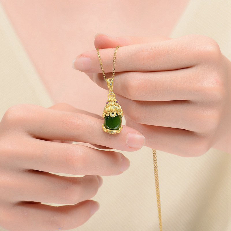 Natural Jade Pixiu Necklace – woman hands holding green jade pendant, necklace jewelry
