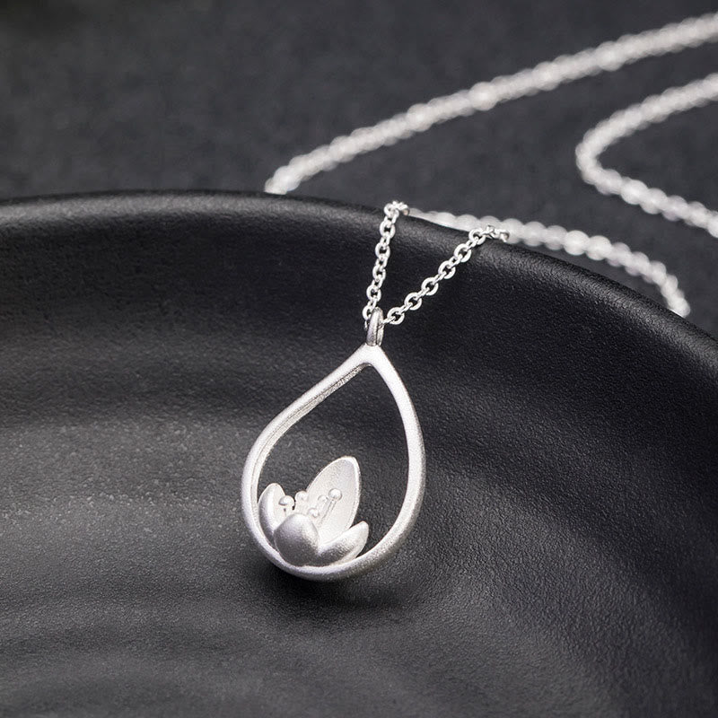 Sterling Silver Lotus Pendant – On curved ceramic dish, sculpted bloom, Artisan crafted