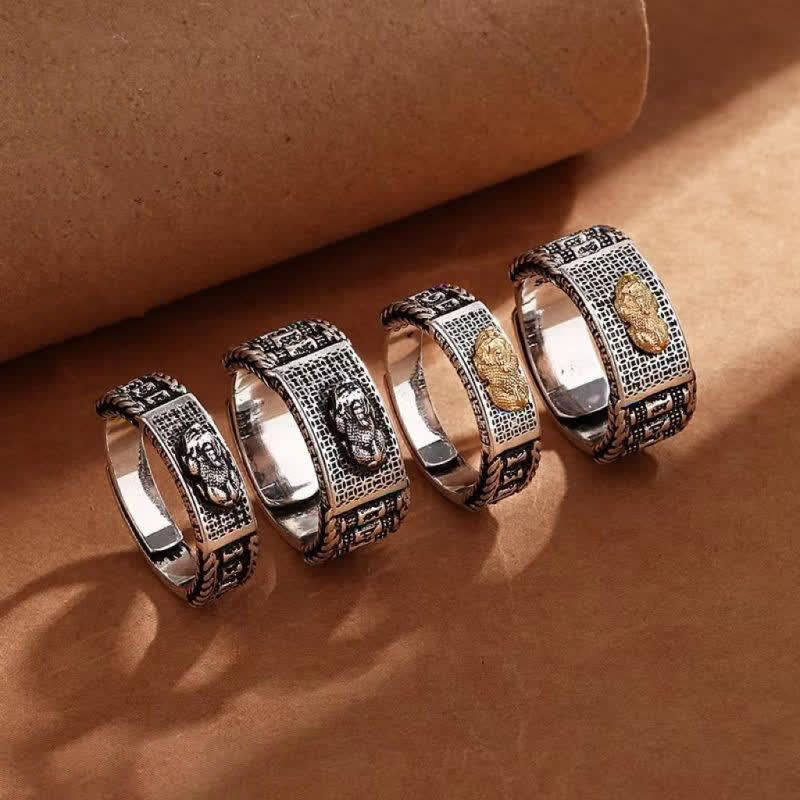 Feng Shui PiXiu Wealth Prayer Wheels Couple Ring – four rings arranged in row showing size variations and silver gold contrast, couple set