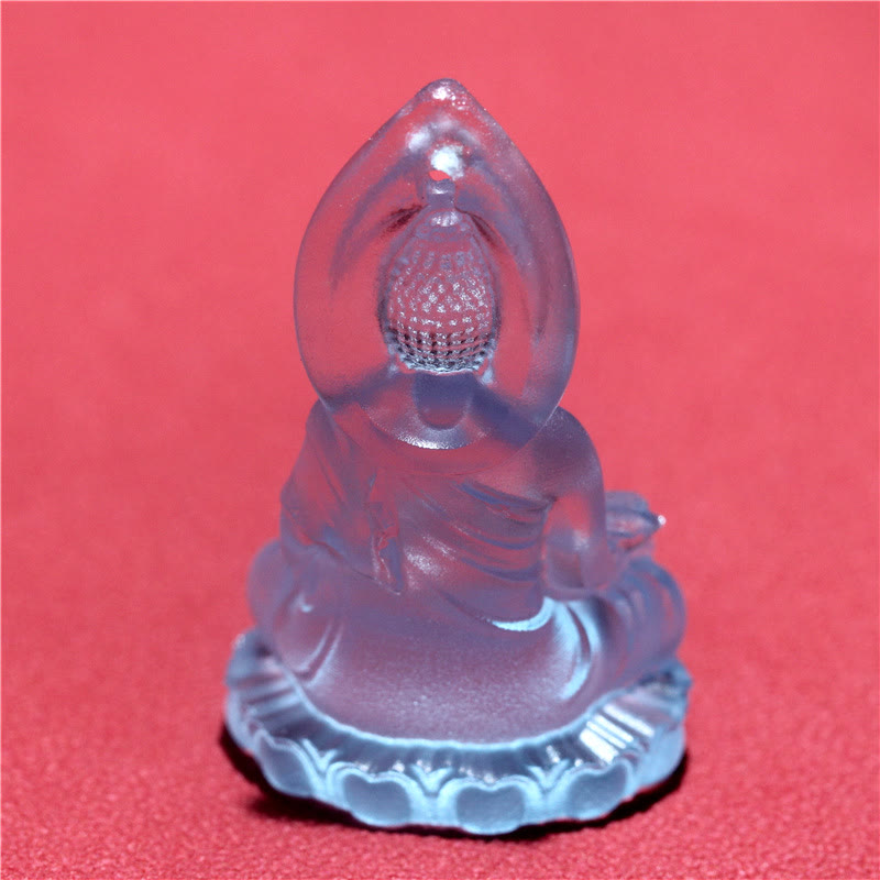 Blue Tathagata Medicine Buddha Liuli Crystal Necklace – low-angle array of translucent blue pendants with drilled halo holes, black background, wholesale glow display
