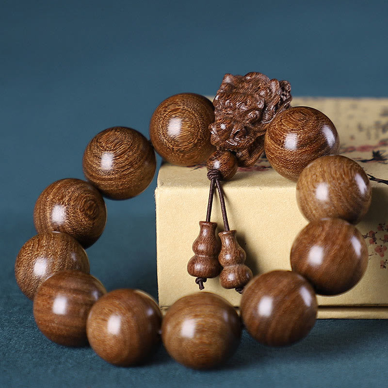 Multi-Wood Dragon Bracelet - Natural grain beads with dragon head tassel on vintage box, Wisdom