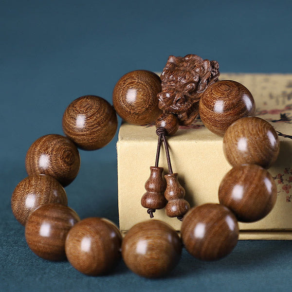 Multi-Wood Dragon Bracelet - Natural grain beads with dragon head tassel on vintage box, Wisdom