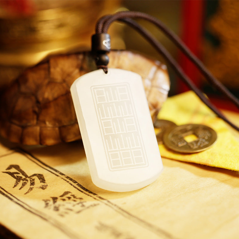 White Jade PiXiu Pendant – Back of white jade pendant with bagua pattern on tortoise shell and compass