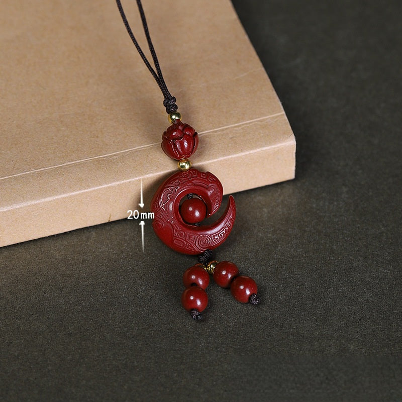 Vermilion Cinnabar Phone Charm, angled view