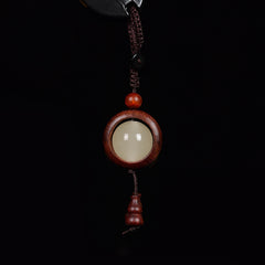 Feng Shui Sandalwood Keychain with Luminous Bead – Bloodwood red-brown version with glowing center and matching gourd pendant