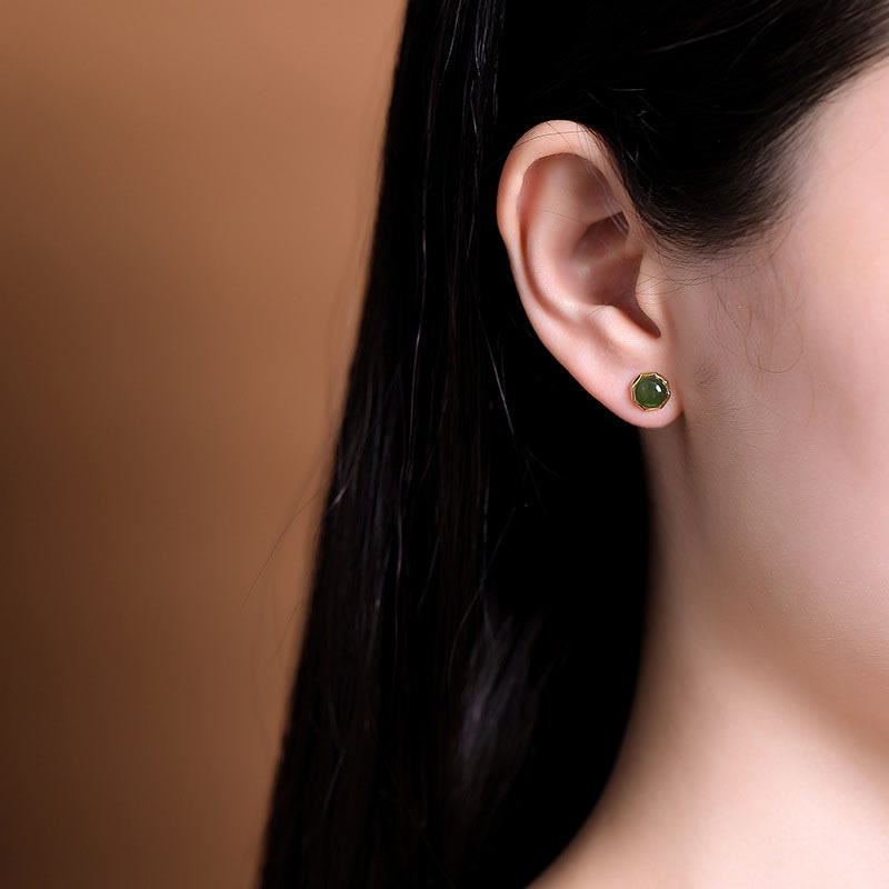 Hetian Cyan Jade Gold Plated Silver Stud Earrings model wearing right ear