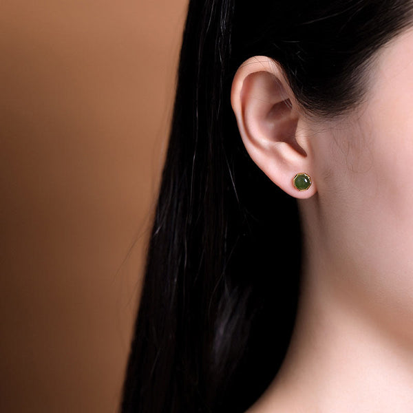 Hetian Cyan Jade Gold Plated Silver Stud Earrings model wearing right ear