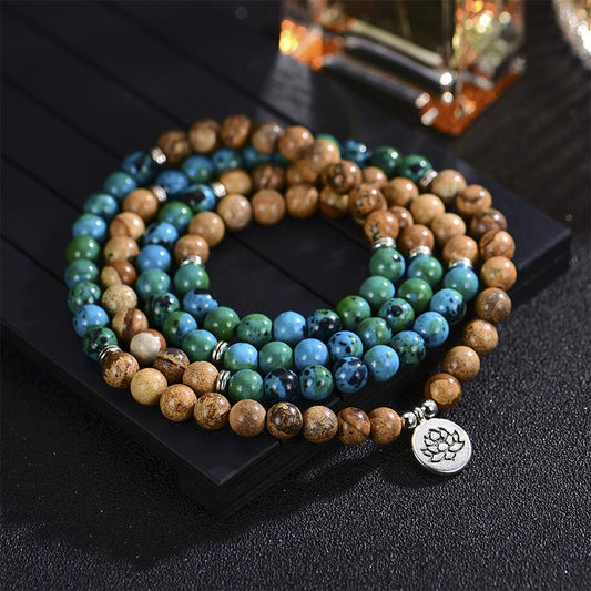 108 Meditation Healing Multilayer Mala – Three-tone stone bead coil with silver lotus charm on dark surface, meditation