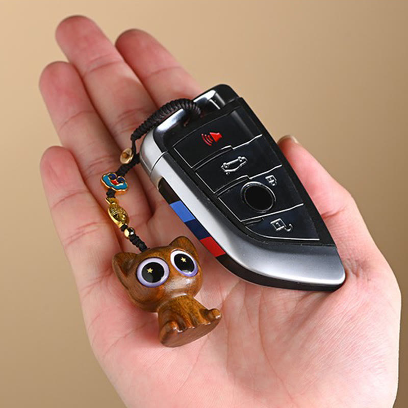 Green Sandalwood Key Chain – warm lighting, koi fish color, lucky cat charm glow