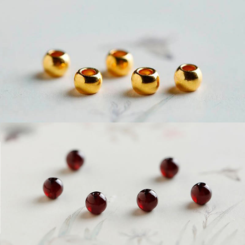 999 Gold Koi Bracelet – comparison size reference with coin, natural garnet, 999 gold koi charm