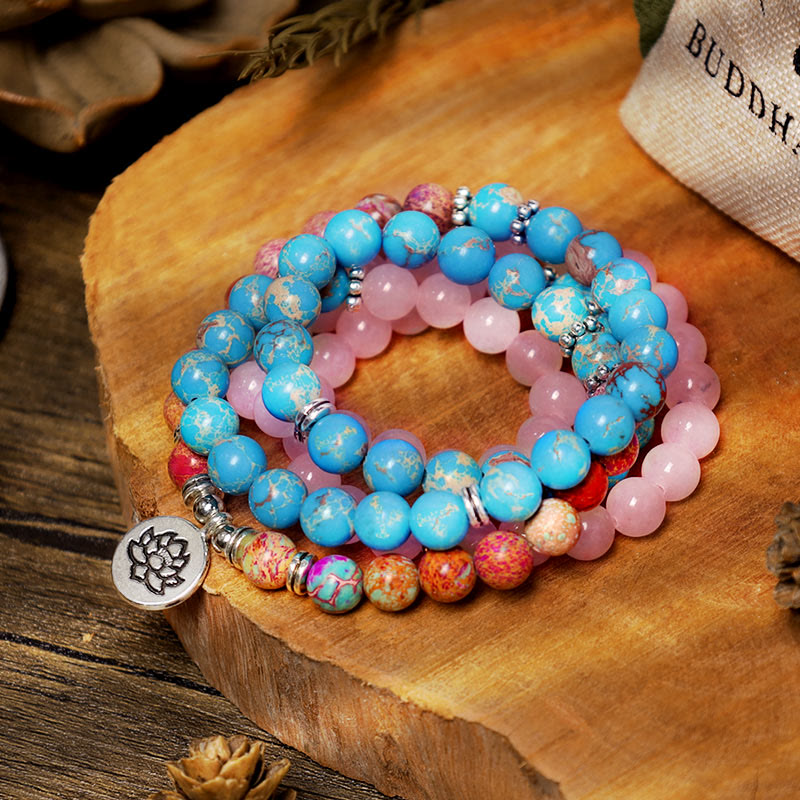 Tibetan Purple Miano Bead Lotus Mala - turquoise and rose quartz beads with lotus charm on wood, wrap bracelet