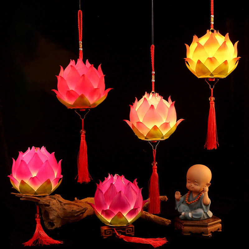 DIY Lotus Dragon Lantern Tassel Lamp – Multiple pink lotus lanterns hanging and resting on driftwood with monk figurine, Serene ambiance