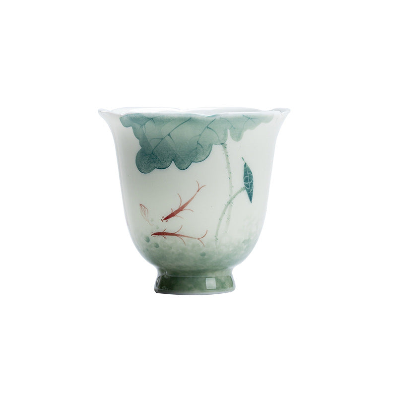 Koi Lotus Teacup – Studio close-up of lotus leaf brushwork texture