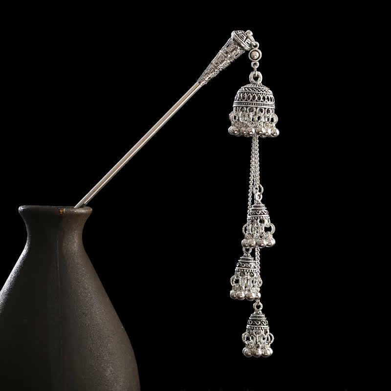 Bells variant triple stacked bell tassel on black background