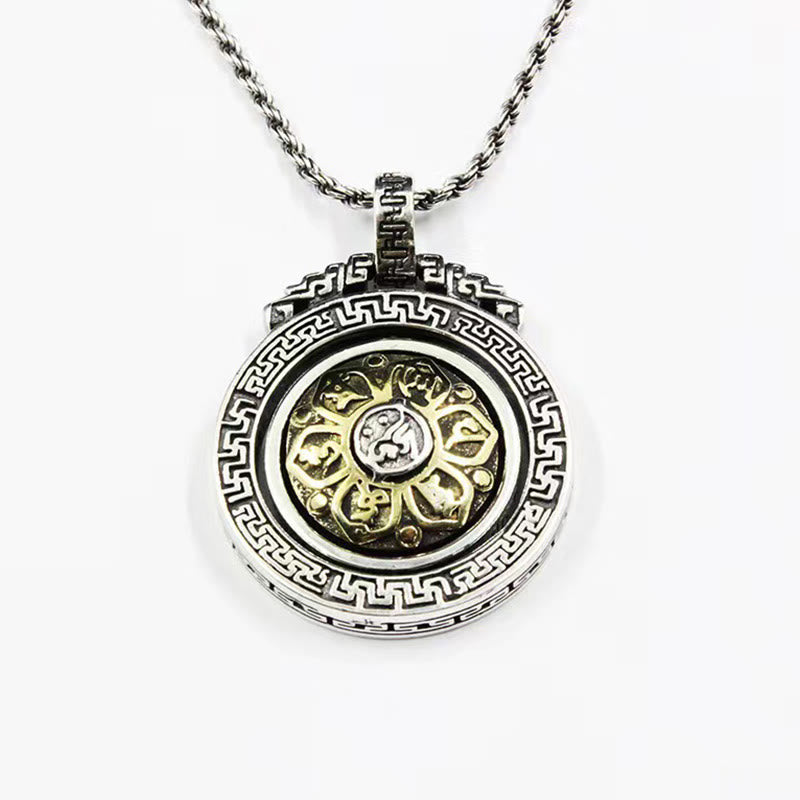 Double Dorje Vajra Rotatable Necklace – elevated view of silver pendant with gold mantra center, spiritual necklace