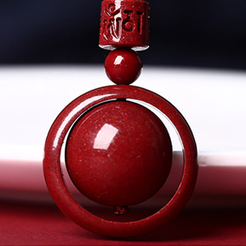 Cinnabar PiXiu Necklace – Black cord front close-up with white plate background, cinnabar wealth pendant