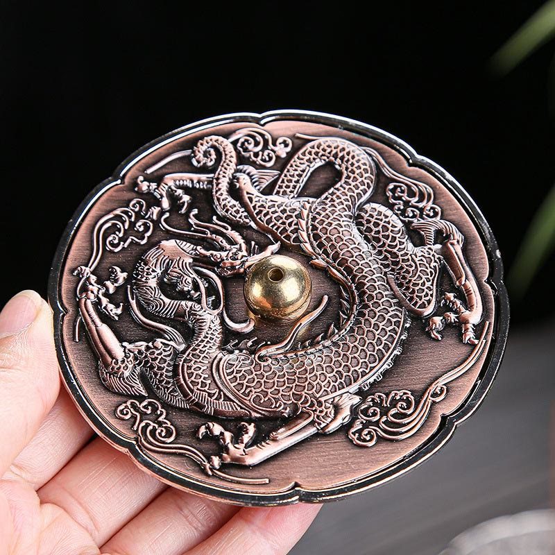 Round Dragon Copper Incense Burner - Held in hand showing scalloped edge and relief depth, artisan craft