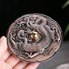 Round Dragon Copper Incense Burner - Held in hand showing scalloped edge and relief depth, artisan craft