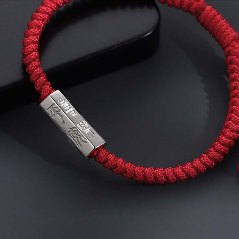925 Sterling Silver Letter Blessing String Bracelet – Red cord with two silver engraved Ping An peace blessing bars on dark reflective surface with elegant styling
