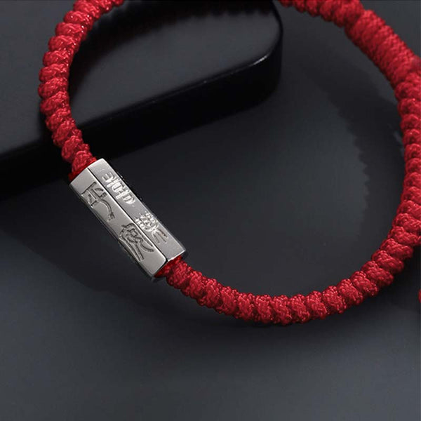 925 Sterling Silver Letter Blessing String Bracelet – Red cord with two silver engraved Ping An peace blessing bars on dark reflective surface with elegant styling