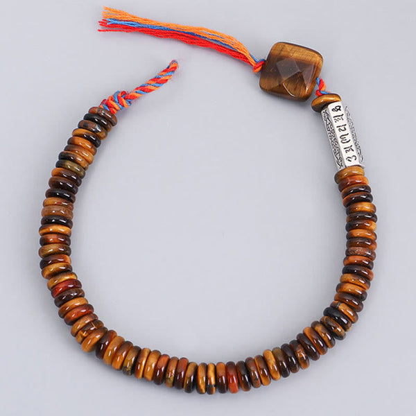 Tiger Eye Om Mani Padme Hum Bracelet - overhead flat lay showing full bead arrangement
